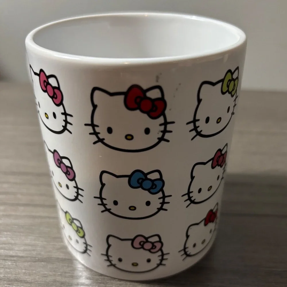 Sanrio Hello Kitty Coffe Mug White with Multiple Hello Kitty Faces 14oz Ceramic